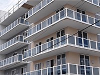<b>Waves Condominiums on 125th Street Bayside Ocean City MD  Ultralox railing with Ocean Blue glass progress shot</b>